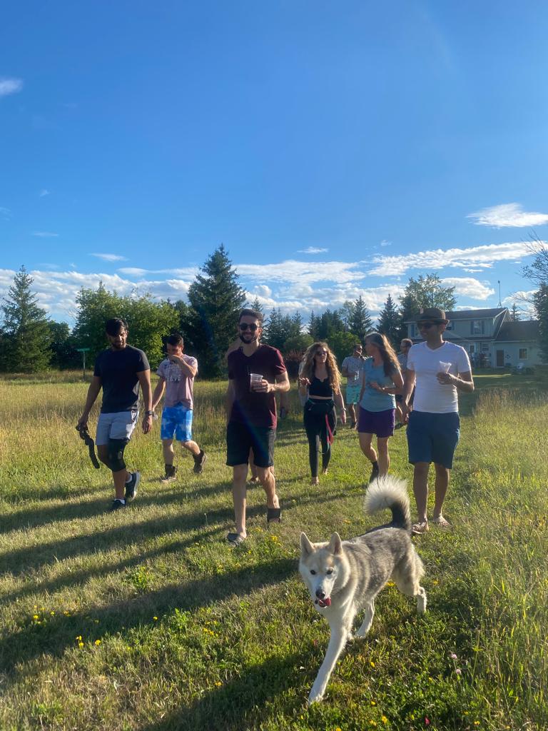 Community walking the farm fields together