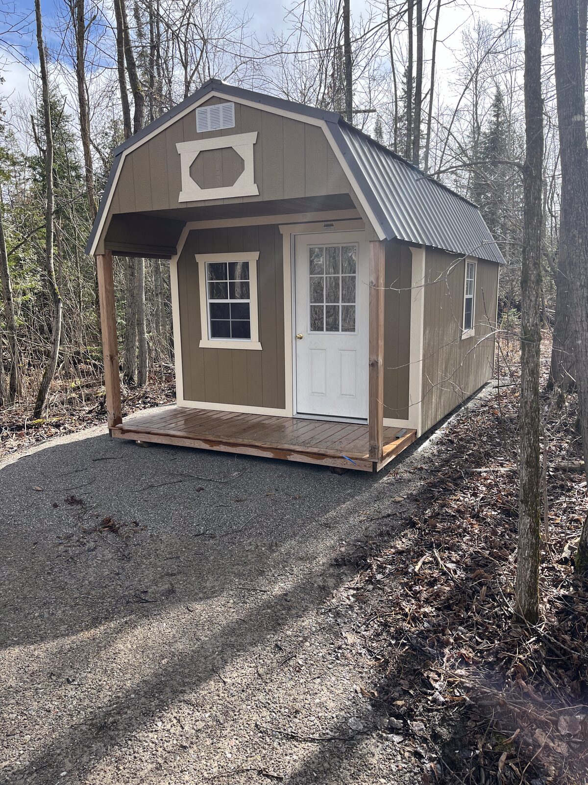 Tiny cabin exterior in early spring